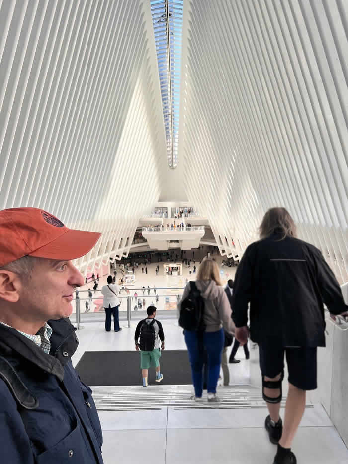 Jared giving a tour inside the Oculus in NYC - a hub of tourism, shopping and transportation.