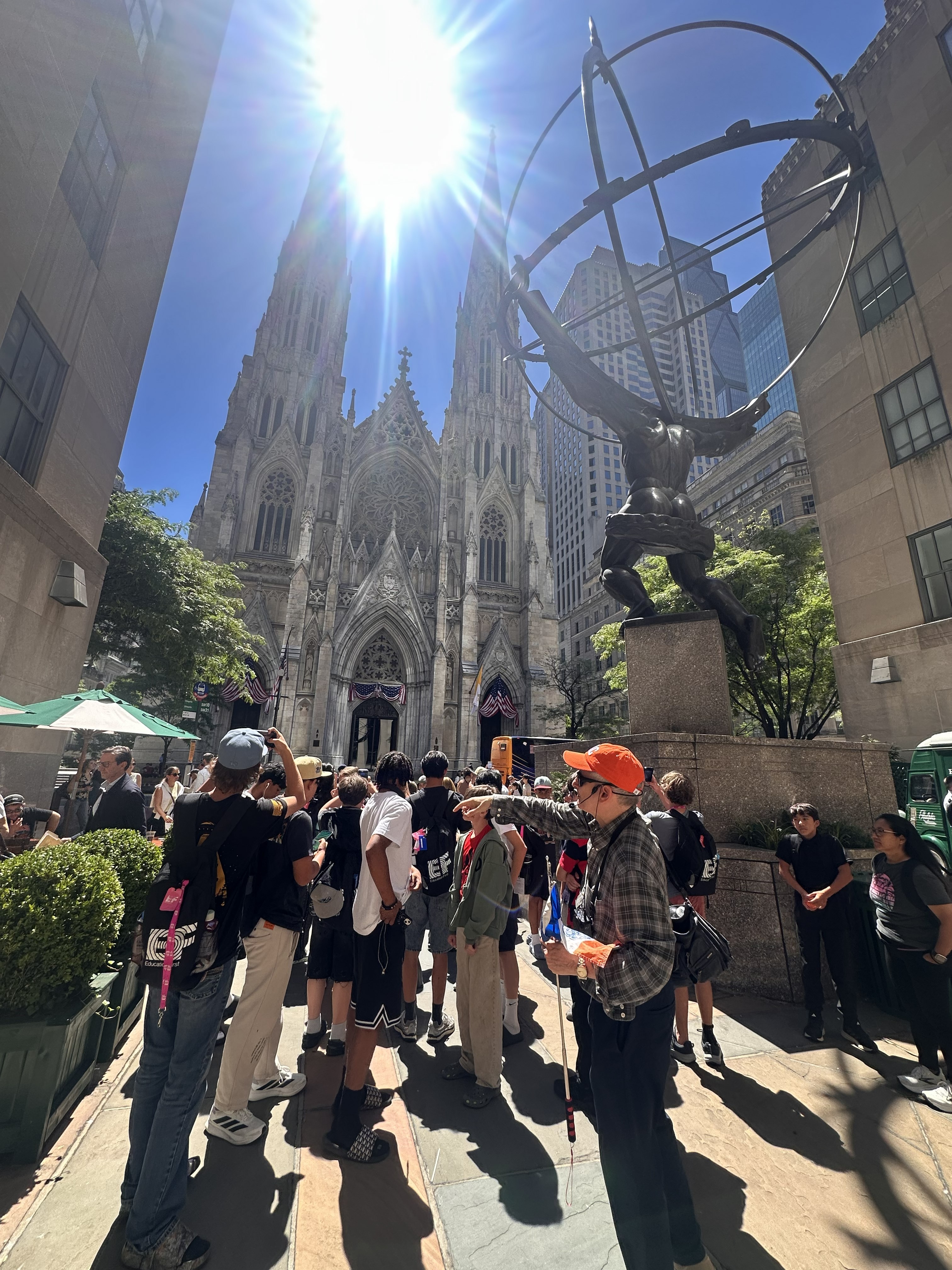 Jared with a group in front of St. Patrick's Cathedral and Rockefeller Center,NYC