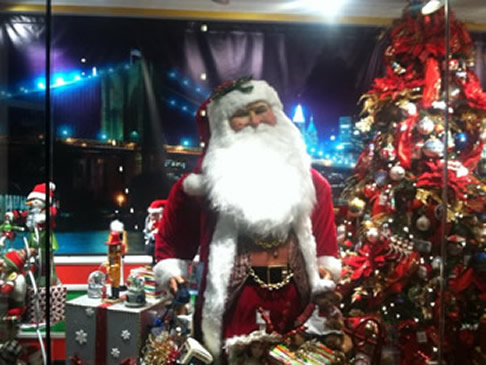 Christmas window in NYC decorated with Santa